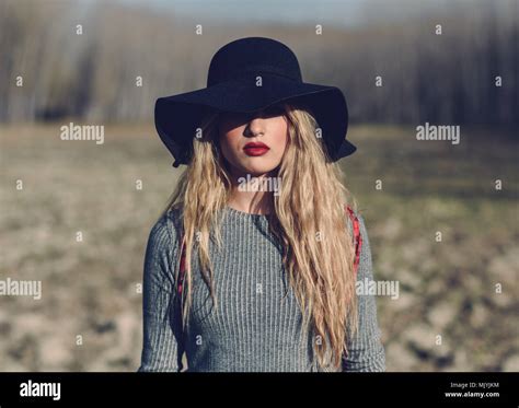 Beautiful Young Blonde Woman Model Of Fashion In Rural Background