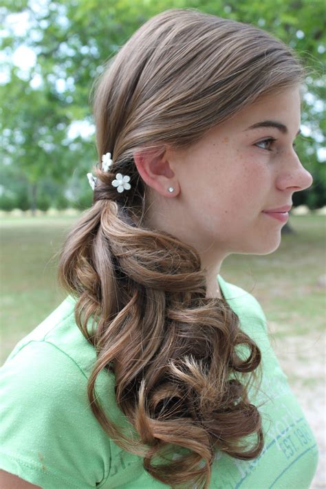 Neat ponytail style with voluminous curls. side pony tail with lots of curls Hair by Liz Perniciaro ...
