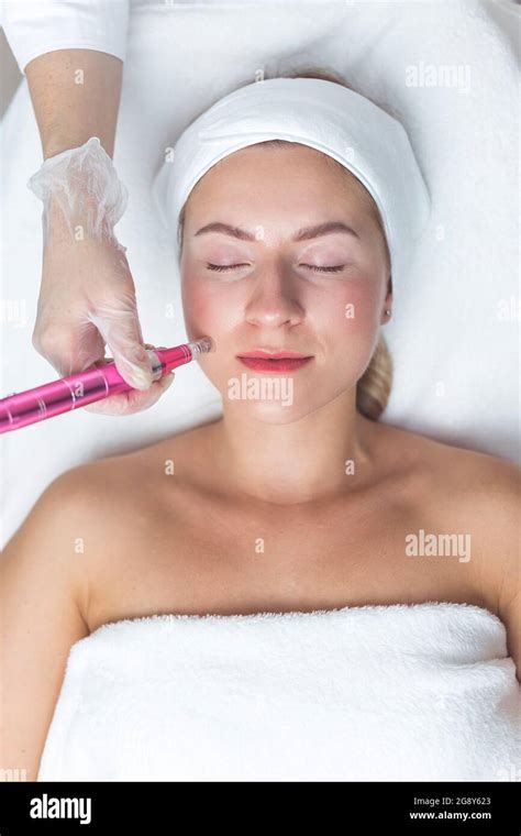 Woman Having Facial Treatment In Beauty Salon Closeup Oxy Derma