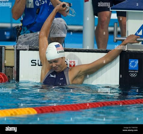 Natalie Coughlin Of The Usa Celebrates Her Gold Medal Win In The Women