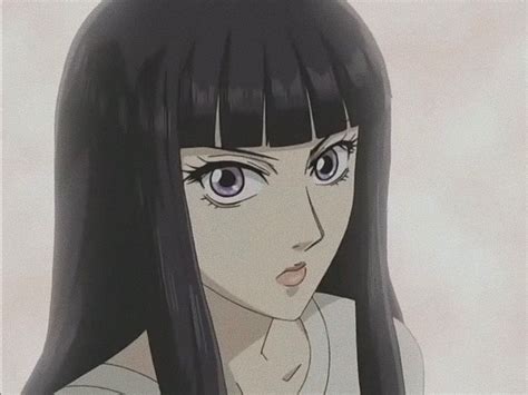 An Anime Character With Long Black Hair And Blue Eyes