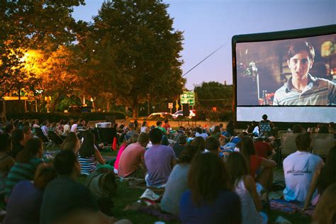 We setup an outdoor movie in a parking lot, field or wherever. Rosslyn Outdoor Film Festival 2017