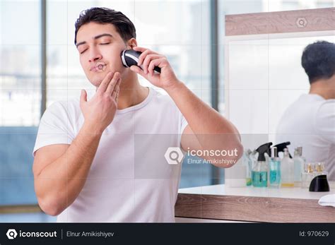 Jpeg image file format was standardized by the joint photographic experts group and, hence, the name jpeg. Premium Young Handsome Man Shaving In The Morning Photo ...