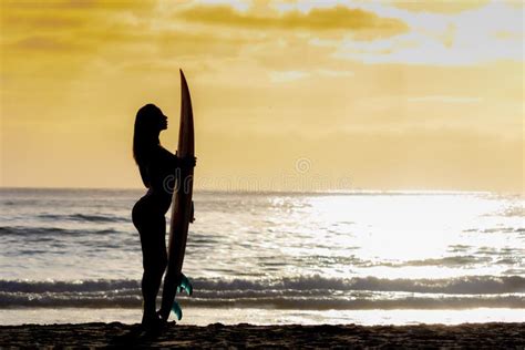 Lovely Brunette Bikini Model With Her Surfboard On A Beach Stock Image Image Of Brunette