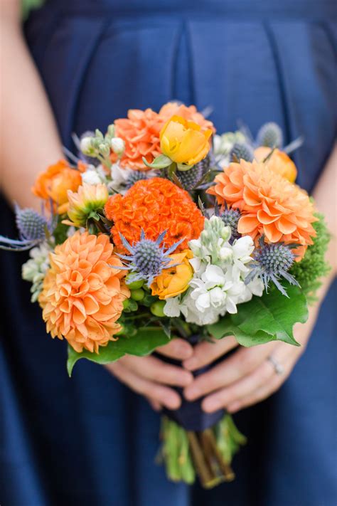 Looking to send fresh flowers or gifts flowers for valentine's day delivery are done through our local florist or a local flower shop. Orange and blue bouquet #harringtonflowers #blueflowers # ...