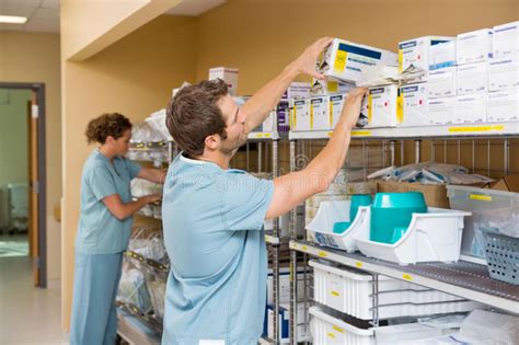 The sales organisation is consisiting of not only a sales and marketing director for italy, but also by product managers, product specialists, sales agents and distributors which with continual training and courses collaborate with the medical profession to develop more and more knowledge and skills. Nurses Arranging Stock In Storage Room Stock Image - Image ...