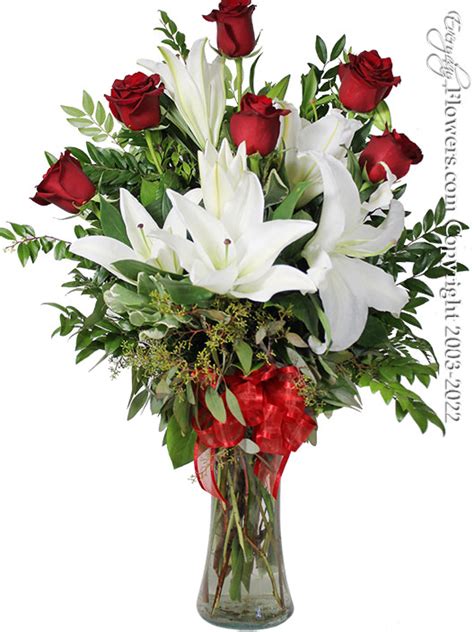 The Red Rose Bouquet Featuring White Lilies Delivery By Avante Gardens