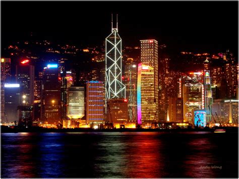 Night View Of Victoria Harbour In Hong Kong Cityscape