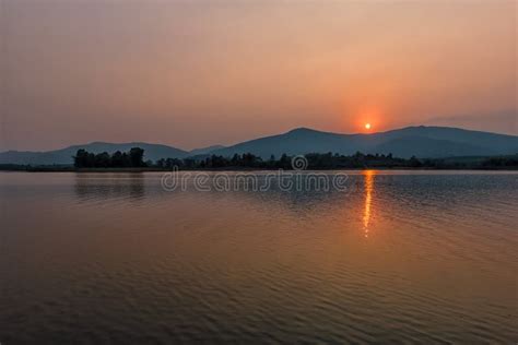 Sunset On Mountain Lake In Chiang Rainorth Of Thailand Stock Photo
