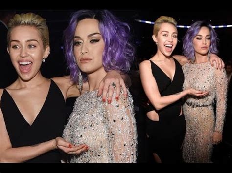 Grammys Miley Cyrus Cops A Feel As She Grabs Katy Perry S Boobs
