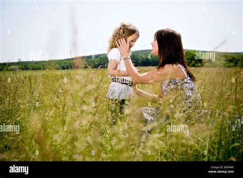 Mother Talking To Daughter Stock Photo Alamy