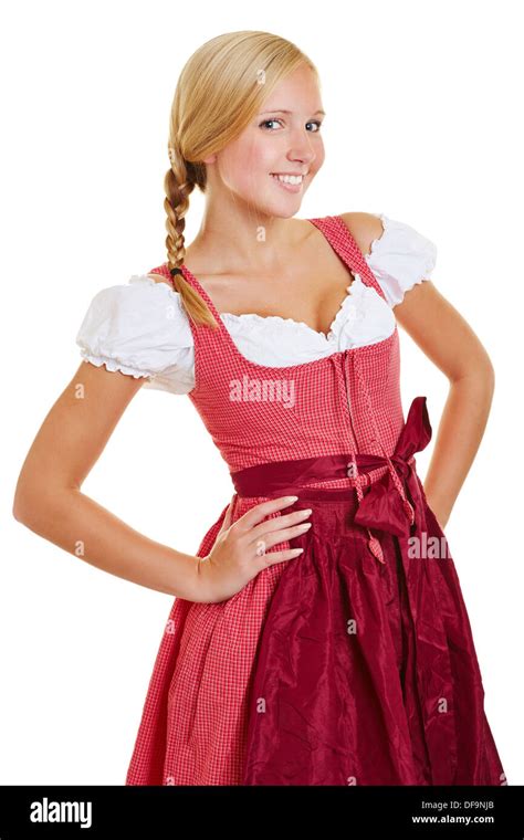 Young Attractive Bavarian Woman In A Dirndl With Arms Akimbo Stock