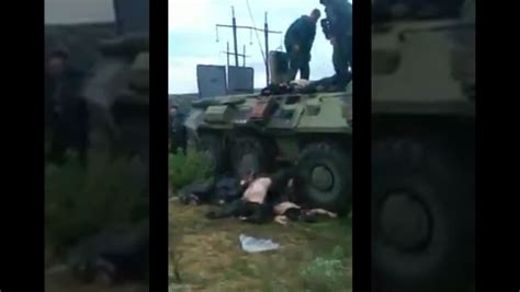 rare video russian soldiers clean out an apc filled with the bodies of killed chechen