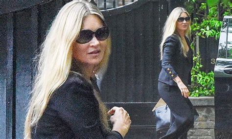 Kate Moss Wears Black Flared Suit During Lockdown Outing