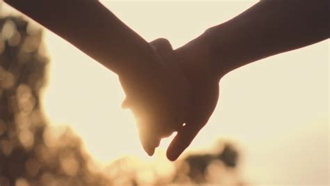 Stock Footage Of Close Up Of Two Lovers Joining Hands Slow Motion 240