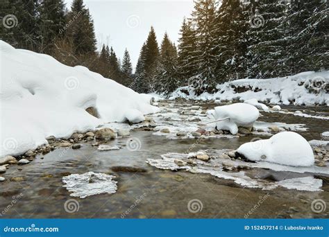 Morning On Frozen River In Winter Low Angle Photo Focus On Creek And