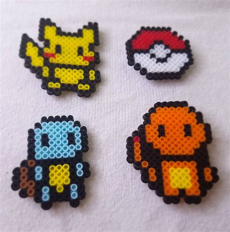 Pokemon Pin Set Includes Pikachu Charmander Squirtle And A Pokeball For Or Each For