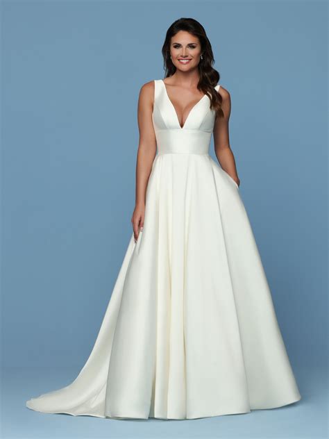 This Simple Mikado Gown Has A Deep V Neckline With A Detachable Modesty