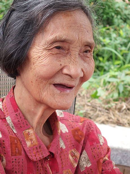 Old Chinese Woman Friendly Toothless Toothy Smiling Outdoors Portrait