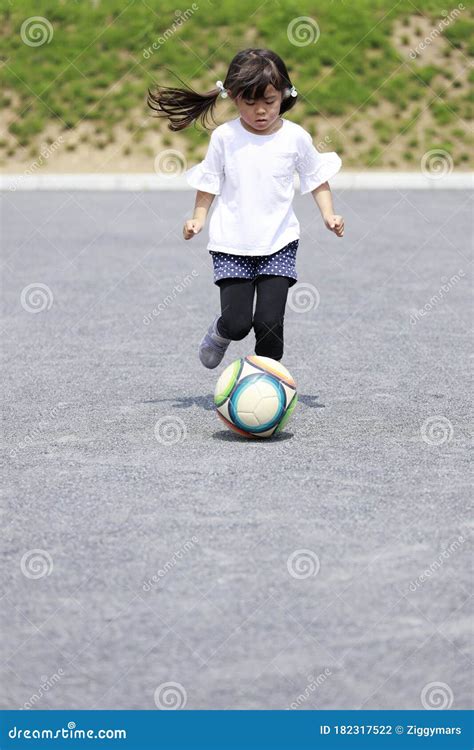 Japanese Girl Dribbling Soccer Ball Stock Photo Image Of Cute Child
