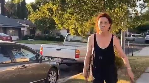 Watch Racist Woman Attacks Neighbours Car With Hammer Gets Attacked