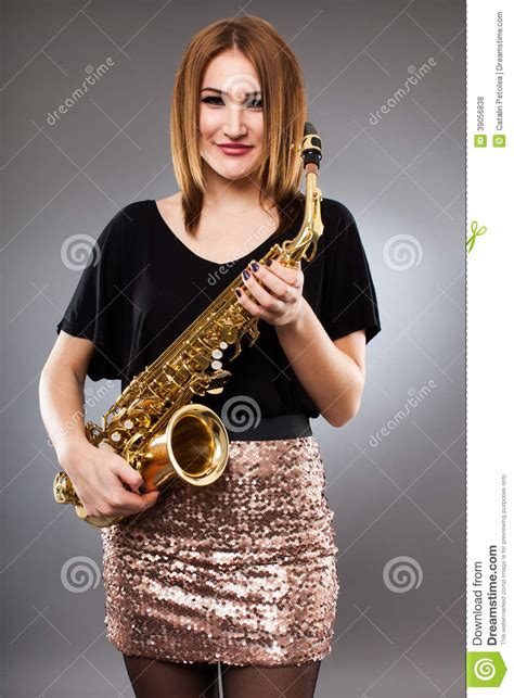 sexy blond female saxophone player musician stock image 8799451