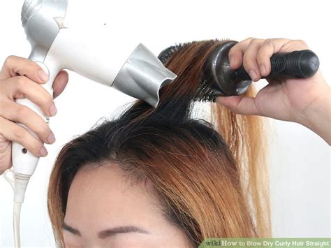 Also take handfuls of hair and gentle move the scalp to and fro, and side to side, to loosen tension and promote blood flow. 3 Ways to Blow Dry Curly Hair Straight - wikiHow