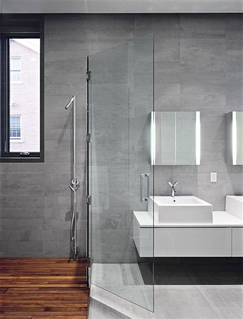 Glass shower enclosures and doors also make bathrooms look much modern and stylized as opposed to other traditional ways of implementing showers. ultra modern bathroom with glass door shower - Decoist