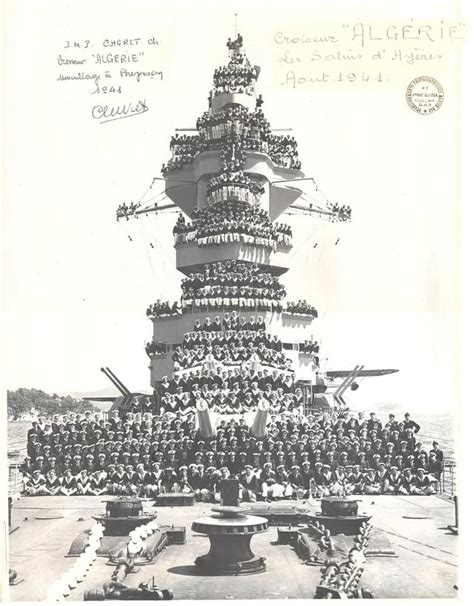 Crew Of The French Heavy Cruiser Algérie Gathered Around The Guns And