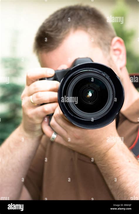 Photographer At Work Stock Photo Alamy