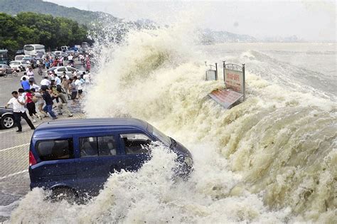 Bore Tides Against The Current Flood In China Tsunami Waves Tsunami