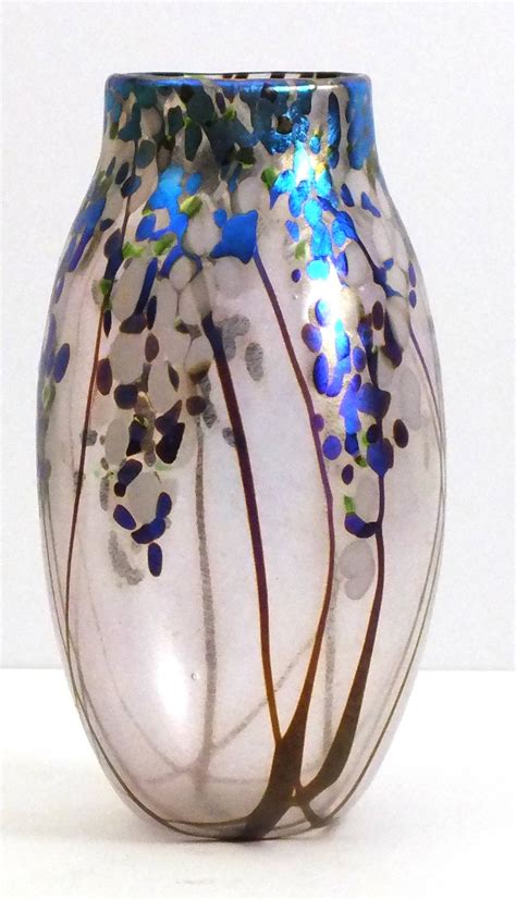 Norman Stuart Clarke B 1944 A Hand Blown Glass Vase Of Ovoid Form With Iridescent Wisteria Deco
