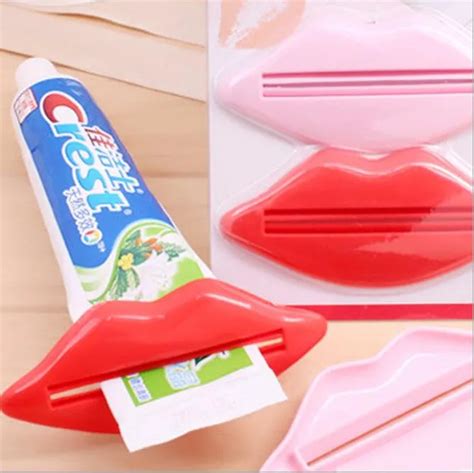 Sexy Hot Lip Kiss Bathroom Tube Dispenser Toothpaste Cream Squeezer Home Tube Rolling Holder