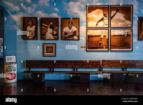 Photographs Of Roberto Clemente With Angel Wings At Right By