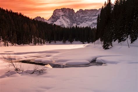 Free Photo Landscape Photography Of Body Of Water Covered With Snow