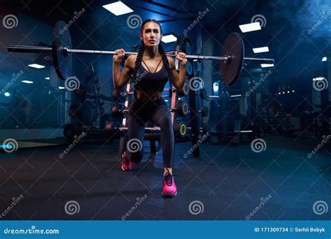 Woman Doing Squats With Barbell Stock Photo Image Of Fitness Body
