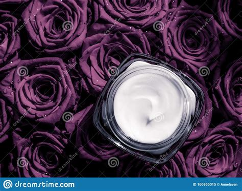 Face Cream Skin Moisturizer On Purple Roses Flowers Luxury Skincare