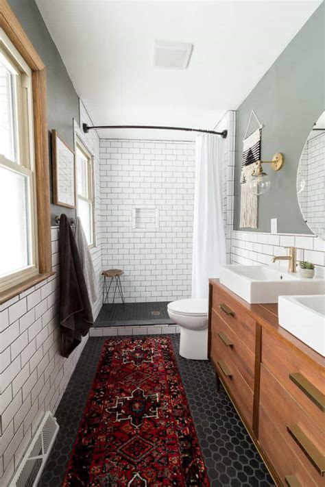 This subway tile bathroom looks relatively de rigueur.until your eye lands on the floor. Modern Bathroom with Subway Tile Reveal - Bright Green Door