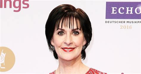 Reclusive Enya ‘lives Like A Queen In A Castle With Her Cats Report