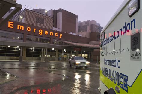 Ambulances sit in front of the emergency department at Hospital in ...