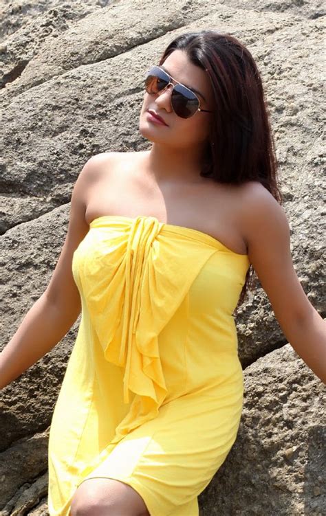 Tashu Kaushik Latest Hot Photoshoot Stills In Yellow At Beach Hq Pics