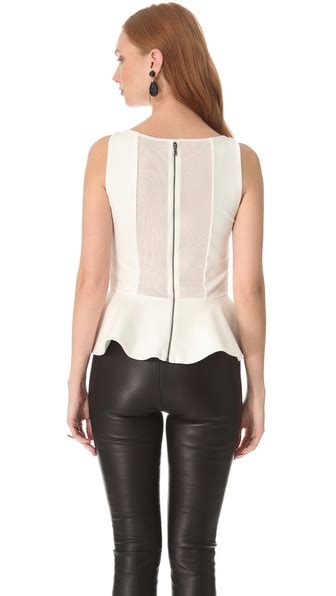 Lyst Alice Olivia Sleeveless Peplum Top In Natural