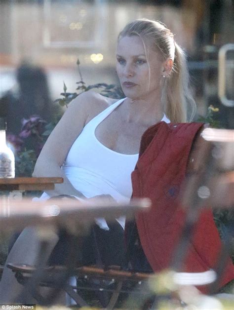 Nicollette Sheridan Looks Forlorn As She Stares Off Into Space While Having Lunch With Mystery