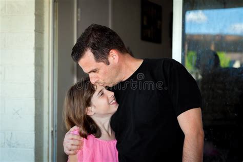 Father Kisses Daughter On Forehead Stock Image Image Of Affection