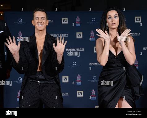 Designer Jeremy Scott And Singer Katy Perry Participate In A Handprint Ceremony At Tcl Chinese