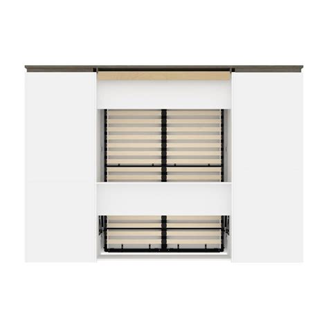 An Open Window With Blinds On The Top And Bottom Part Of It In Front