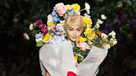 moschino s spring 2018 flower dresses are the latest in a decades long trend vogue