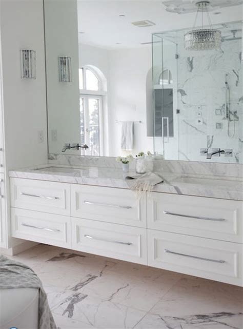 A beautiful tile floor can turn your ordinary bathroom into a wonderful piece of interior design. 18 large white bathroom floor tiles ideas and pictures 2020