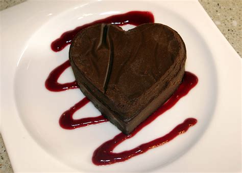 I regularly make chocolate mousse with an egg yolk, sugar and dark chocolate base folded into whipped egg white or whipped cream (or both). Heart-Shaped Chocolate Mousse Cake With Raspberry Sauce
