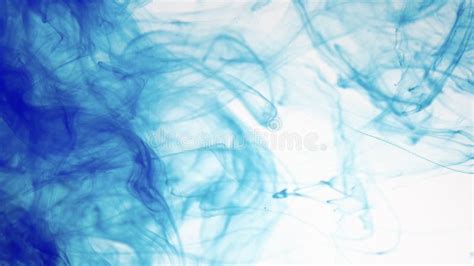 Blue Watercolor Ink In Water On A White Background Blue Cloud Of Ink